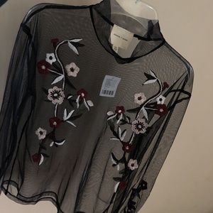 Never worn! Mesh long sleeve embroidered top!
